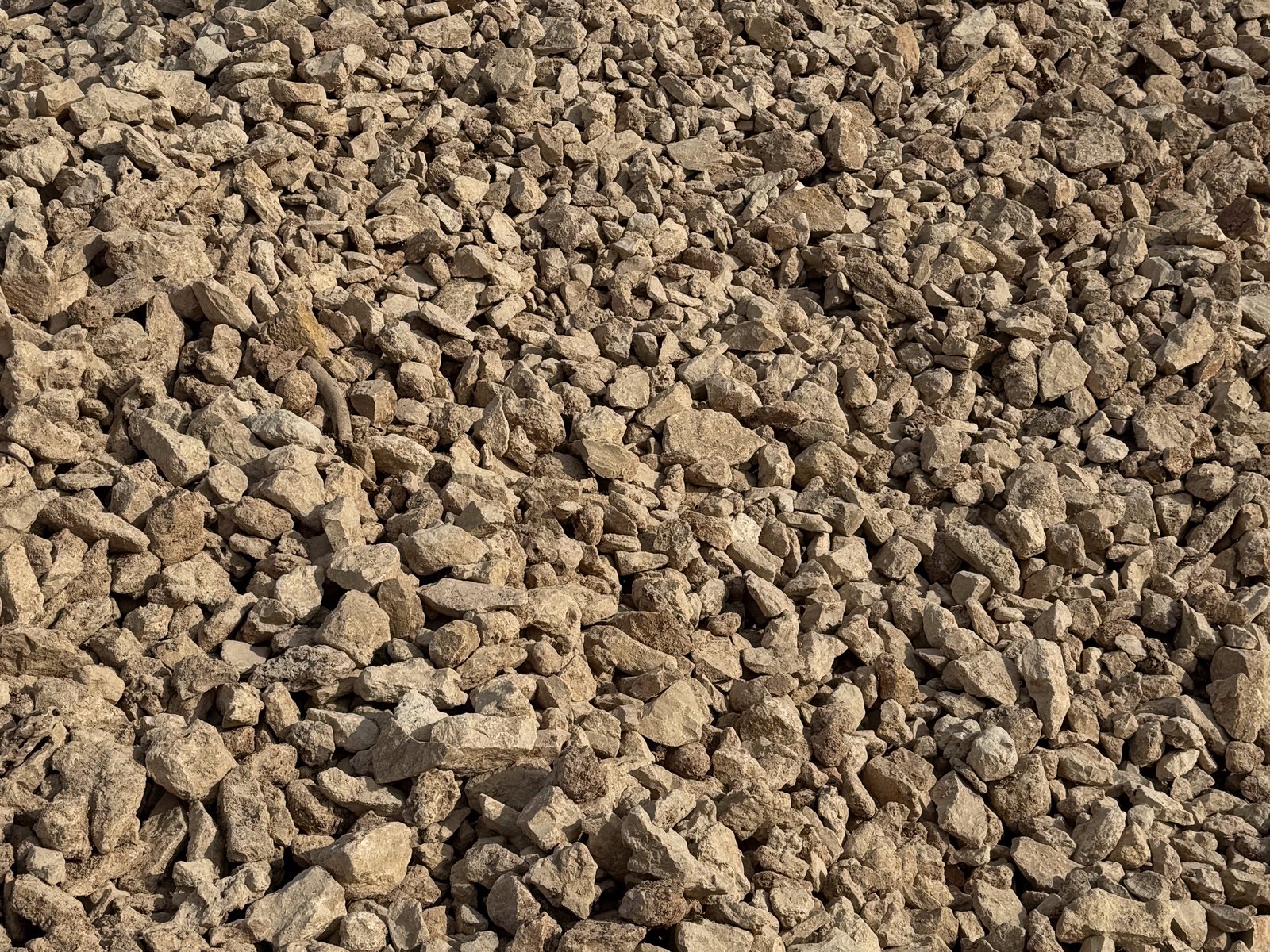 Stockpile of 4 inch minus crushed limestone