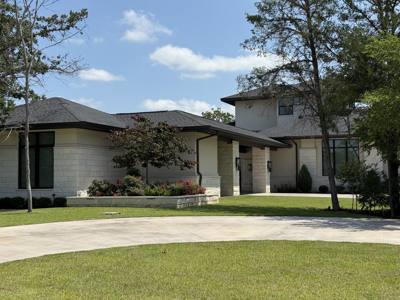 Modern residence — Austin White 8 inch courses, wide view