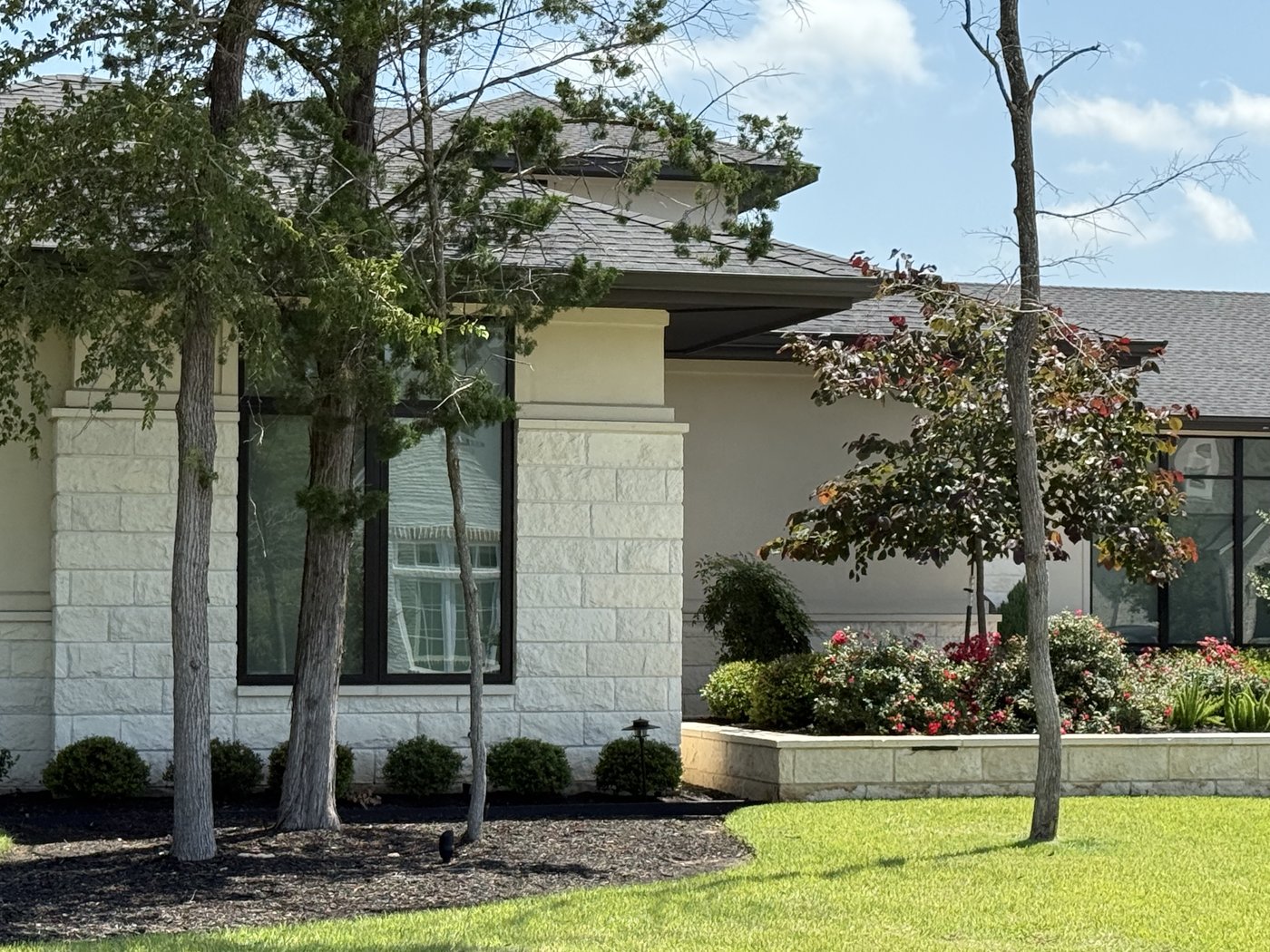Modern residence — Austin White 8 inch courses, side view