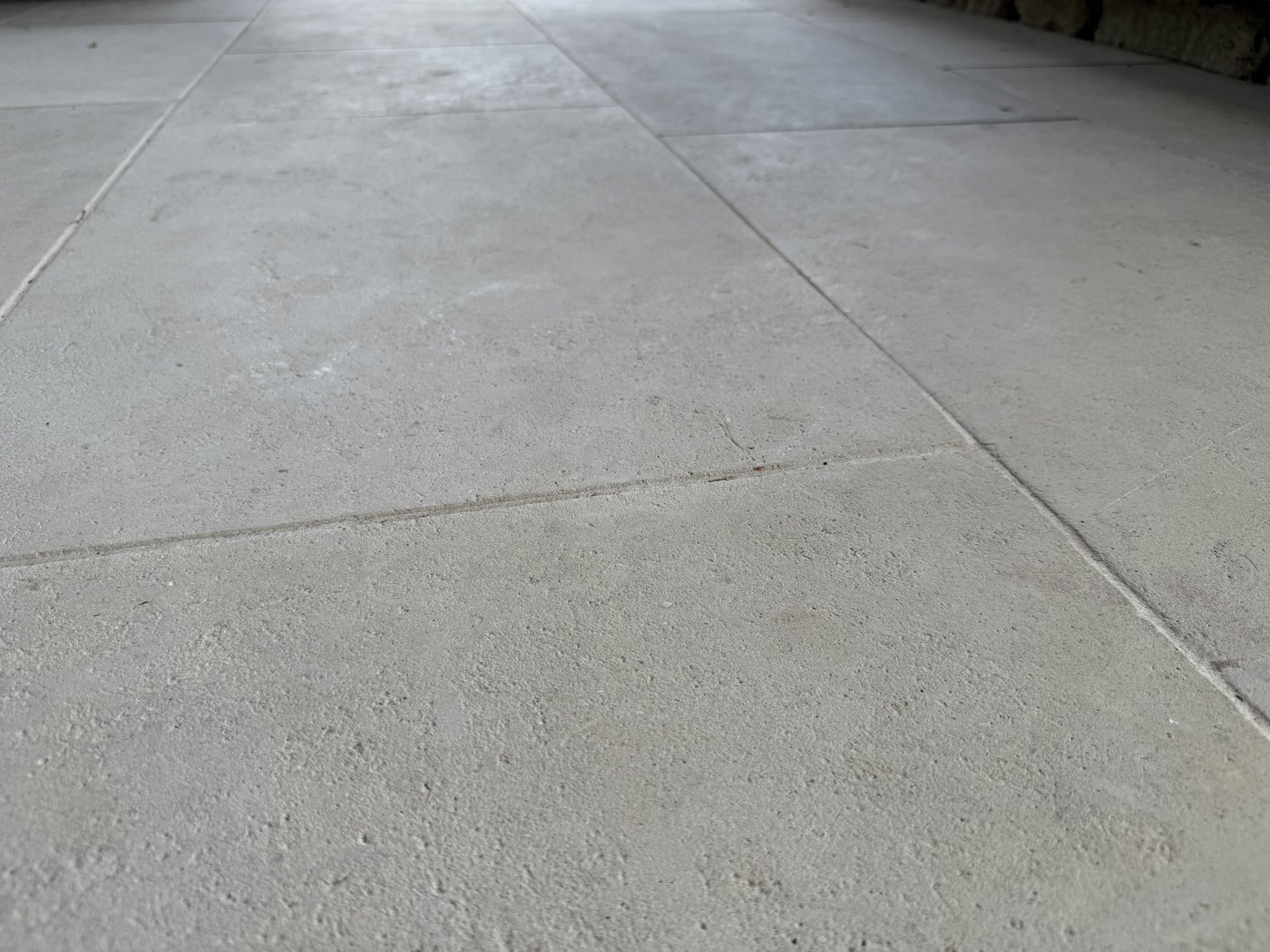 28 inch ledge Castle Grey flooring — perspective view showing the depth of the aged honed surface