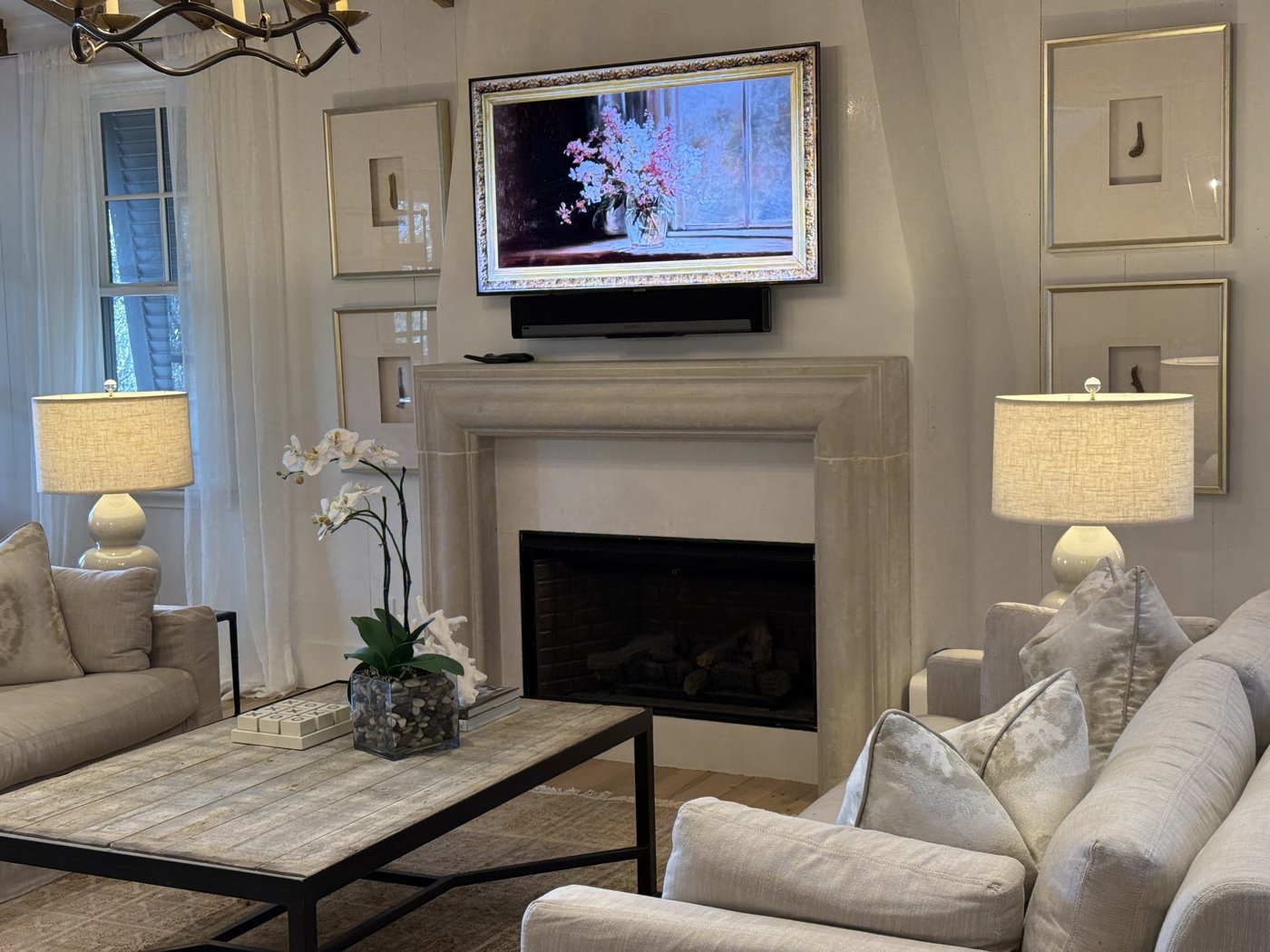 Rosemary Beach FL beach house — honed grey ledge fireplace from a wider angle