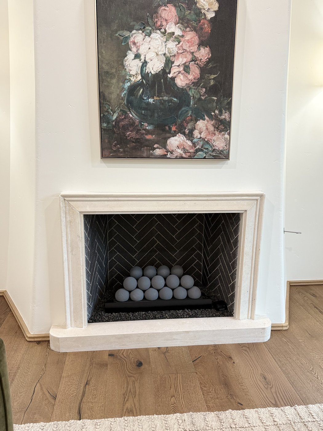 Italian villa — carved white limestone fireplace surround detail