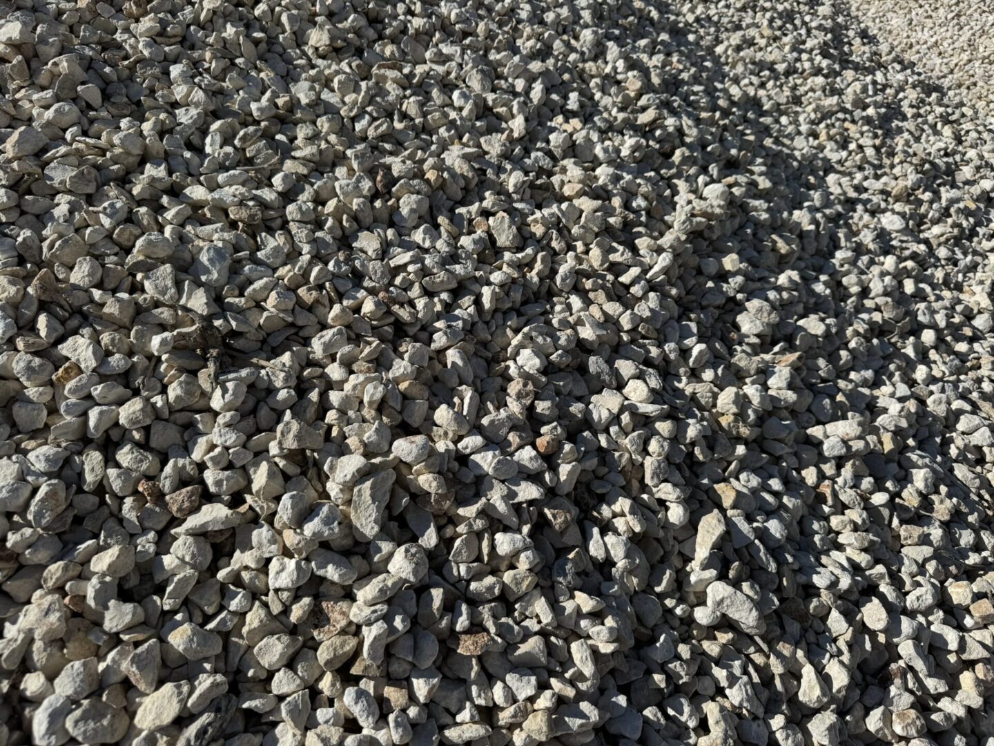 A pile of gravel on the ground.