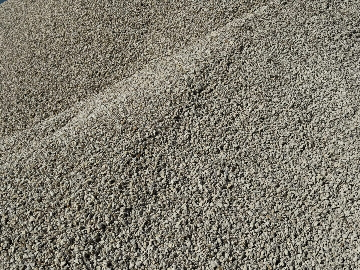 A close up of some sand on the ground