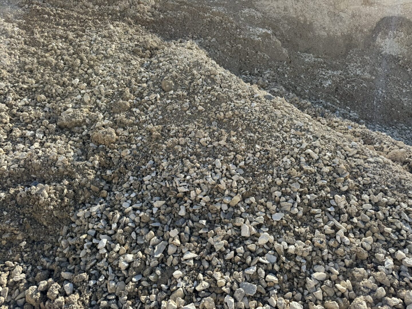 A pile of rocks on top of a hill.