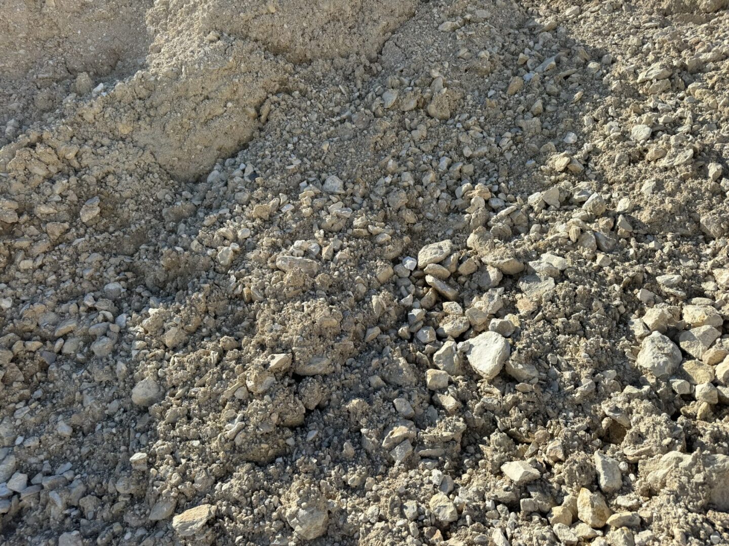 A pile of gravel on the ground.