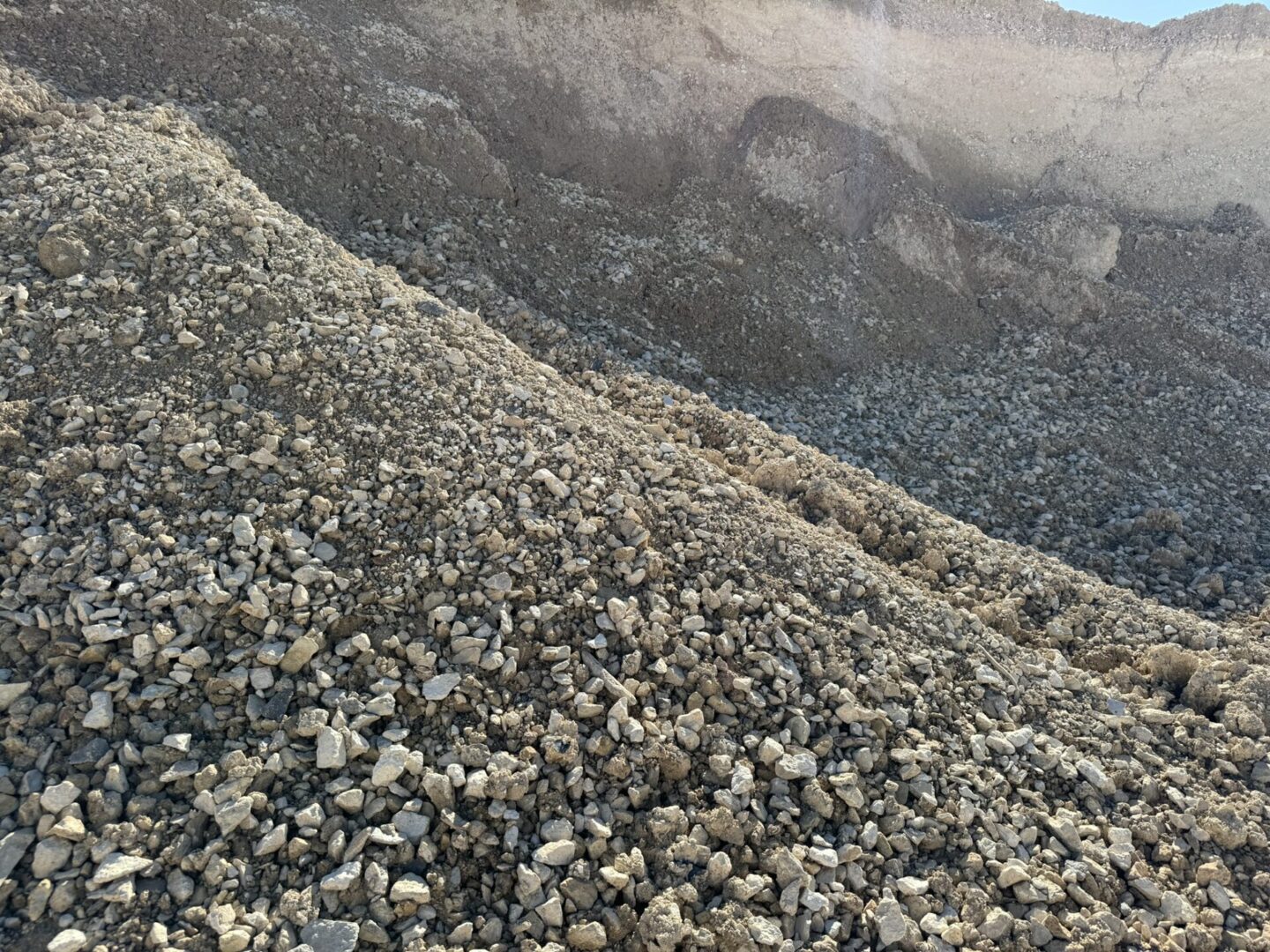 A pile of rocks on top of a hill.